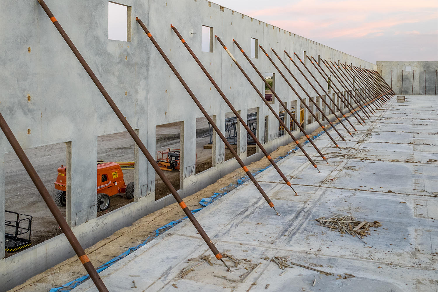 Before concrete cleanup in commercial tilt-wall construction interior