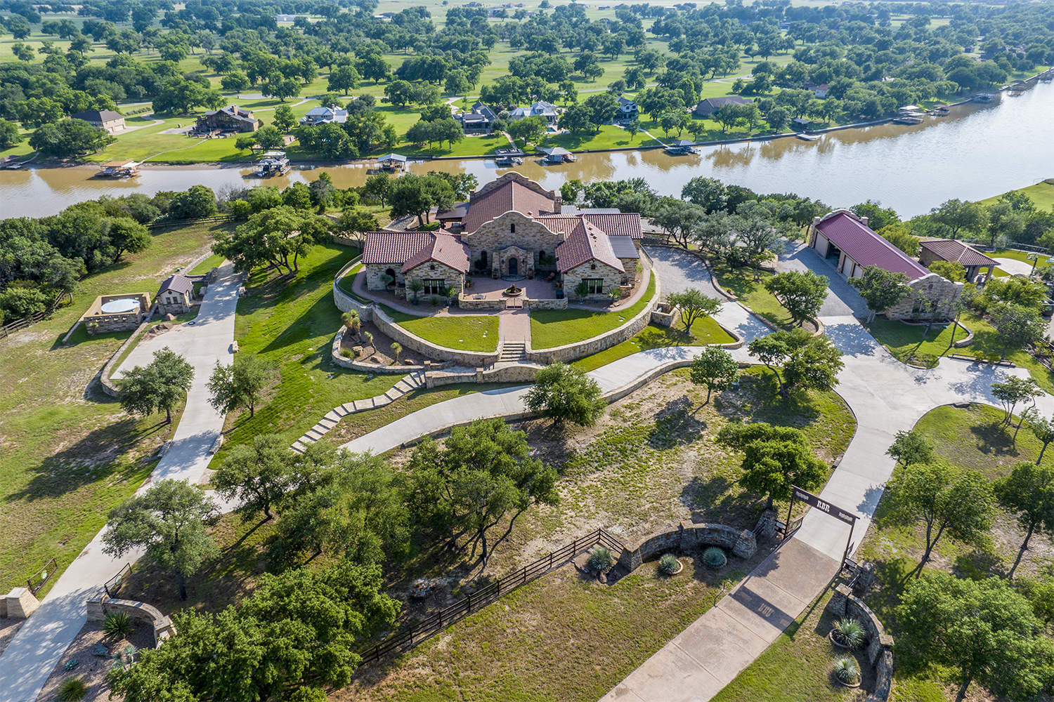 Before landscape correction luxury residential property aerial photography
